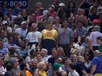 Protesters demonstrate at a match between Coco Gauff, of the United States, and Karolina Muchova, of the Czech Republic, during the women's singles semifinals of the U.S. Open tennis championships