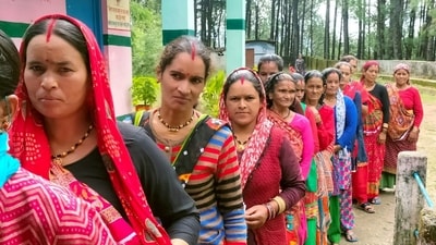 Female voters stand in a queue to cast their votes for Bageshwar Assembly by-polls, at Government Girls Inter College in Bageshwar Tuesday. (ANI Photo) Female voters stand in a queue to cast their votes for Bageshwar Assembly by-polls, at Government Girls Inter College in Bageshwar Tuesday. (ANI Photo)
