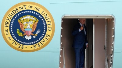 President Joe Biden gestures as he boards Air Force One at Andrews Air Force Base, Md.. (AP)