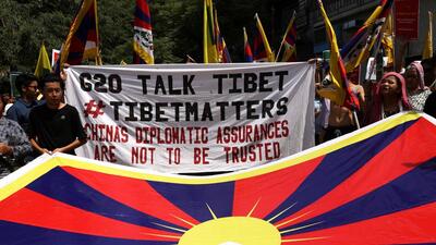 Members of the Tibetan community protest against the Chinese government at their refugee colony in Majnu ka Tilla on Friday (REUTERS) Members of the Tibetan community protest against the Chinese government at their refugee colony in Majnu ka Tilla on Friday (REUTERS)