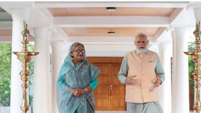 Prime Minister Narendra Modi welcomes Bangladesh Prime Minister Sheikh Hasina before a bilateral meeting, in New Delhi, Friday. (PTI) Prime Minister Narendra Modi welcomes Bangladesh Prime Minister Sheikh Hasina before a bilateral meeting, in New Delhi, Friday. (PTI)