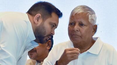 RJD chief Lalu Prasad Yadav with Bihar deputy chief minsiter Tejashwi Yadav (ANI) RJD chief Lalu Prasad Yadav with Bihar deputy chief minsiter Tejashwi Yadav (ANI)