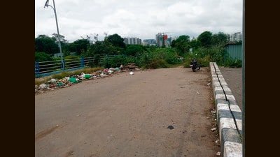 The bridge yet to be opened for public use, leaving hapless residents to take a long route to reach their home or office. (HT PHOTO)