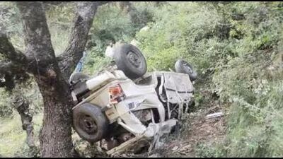 The mangled remains of the SUV that rolled down a hill in Chamba district, leaving three people dead and eight injured on Thursday night. (HT photo)