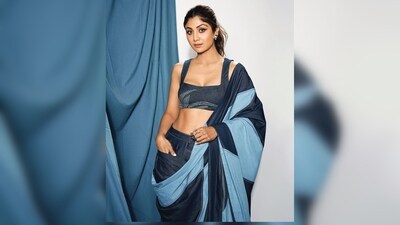 Shilpa Shetty paired her saree with a coordinated denim blouse, effortlessly mastering the denim-on-denim trend, but she added a unique twist to it. (Instagram/@shilpashetty) Shilpa Shetty paired her saree with a coordinated denim blouse, effortlessly mastering the denim-on-denim trend, but she added a unique twist to it. (Instagram/@shilpashetty)
