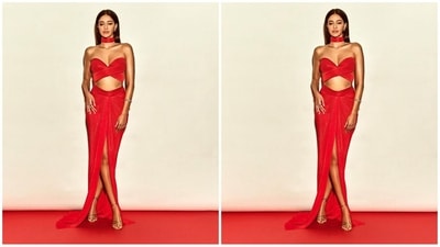 Her outfit consists of a strapless bralette top featuring a sweetheart neckline and a criss-cross pattern. She teamed it with a structured skirt with a belt at the waist, a draped pattern and a thigh-high slit at the centre. (Instagram/@ananyapanday) Her outfit consists of a strapless bralette top featuring a sweetheart neckline and a criss-cross pattern. She teamed it with a structured skirt with a belt at the waist, a draped pattern and a thigh-high slit at the centre. (Instagram/@ananyapanday)