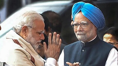 Prime Minister Narendra Modi with former PM Manmohan Singh. Prime Minister Narendra Modi with former PM Manmohan Singh.