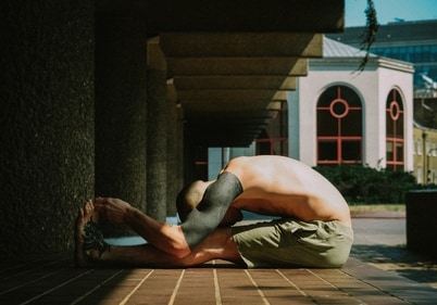 Paschimottanasana or seated forward-bend (Photo by Benn McGuinness on Unsplash) Paschimottanasana or seated forward-bend (Photo by Benn McGuinness on Unsplash)