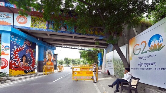 Delhi Police put up barricades at Ring Road near Bhairon Marg ahead of G20 India Summit, in New Delhi, India. (Photo by Sanjeev Verma/ Hindustan Times)
