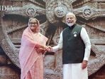 Indian Prime Minister Narendra Modi, right, shakes hand with Bangladesh's Prime Minister Sheikh Hasina upon her arrival at Bharat Mandapam convention centre for the G20 Summit in New Delhi, India, on Saturday, September 9. (HT Photo) Indian Prime Minister Narendra Modi, right, shakes hand with Bangladesh's Prime Minister Sheikh Hasina upon her arrival at Bharat Mandapam convention centre for the G20 Summit in New Delhi, India, on Saturday, September 9. (HT Photo)