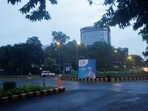 Police are seen on a deserted road on the day of the G20 summit in New Delhi, India, September 9, 2023.