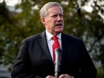 FILE PHOTO: White House Chief of Staff Mark Meadows speaks to reporters following a television interview, outside the White House in Washington, U.S. October 21, 2020. REUTERS/Al Drago/File Photo