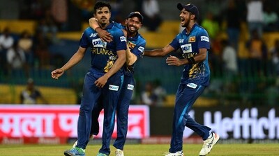 Maheesh Theekshana celebrates with teammate Sadeera Samarawickrama after taking the wicket of Towhid Hridoy (AFP) Maheesh Theekshana celebrates with teammate Sadeera Samarawickrama after taking the wicket of Towhid Hridoy (AFP)