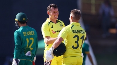 South Africa v Australia - Mangaung Oval, Bloemfontein, South Africa - Australia's David Warner celebrates after reaching his century with Marnus Labuschagne (REUTERS)