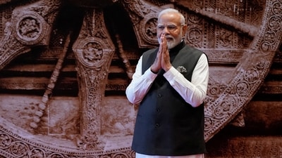 Prime Minister Narendra Modi greets as waits to welcome leaders of the G20 countries in New Delhi on Saturday, (REUTERS)