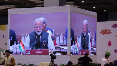 A giant screen displays India's Prime Minister Narendra Modi at the International Media Centre, as he delivers the opening speech during the G20 summit in New Delhi, India, September 9, 2023. (REUTERS)