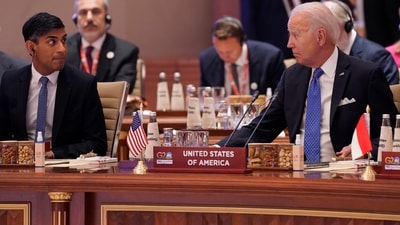 British Prime Minister Rishi Sunak talks with U.S. President Joe Biden during the first session of the G20 Summit in New Delhi on Saturday. (AP) British Prime Minister Rishi Sunak talks with U.S. President Joe Biden during the first session of the G20 Summit in New Delhi on Saturday. (AP)