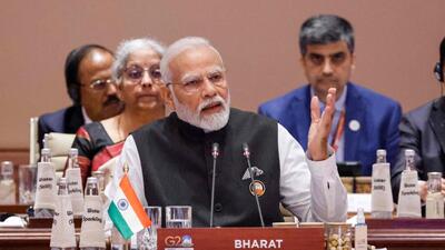 India's Prime Minister Narendra Modi (C) speaks during the first session of the G20 Leaders' Summit at the Bharat Mandapam in New Delhi on September 9, 2023. (Photo by Ludovic MARIN / POOL / AFP) (AFP) India's Prime Minister Narendra Modi (C) speaks during the first session of the G20 Leaders' Summit at the Bharat Mandapam in New Delhi on September 9, 2023. (Photo by Ludovic MARIN / POOL / AFP) (AFP)