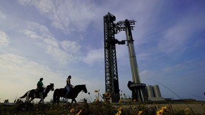 NASA astronaut Sunita Williams, left, and Haley Esparza, right, ride on a horse as they visit SpaceX's Starship on April 19. (AP) NASA astronaut Sunita Williams, left, and Haley Esparza, right, ride on a horse as they visit SpaceX's Starship on April 19. (AP)