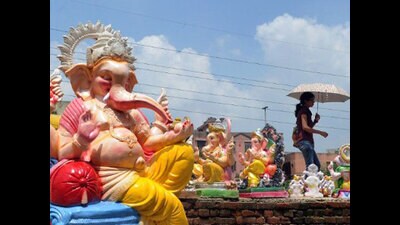 Mangalore University Vice-Chancellor, Jayaraj Amin, has alleged that he was threatened by BJP MLA Vedavyas Kamath to organise the Ganesh Chaturthi celebration at the main campus.