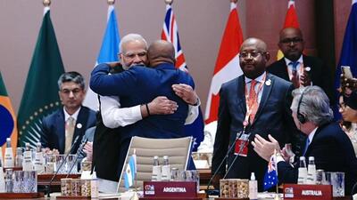 PM Modi greeted African Union President Comoros Azali Assoumani with a hug before the G20 leaders began their deliberations (Twitter/@g20org) PM Modi greeted African Union President Comoros Azali Assoumani with a hug before the G20 leaders began their deliberations (Twitter/@g20org)