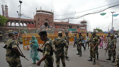 Paramilitary forces patrol outside Jama Masjid in Old Delhi on Saturday. (AP) Paramilitary forces patrol outside Jama Masjid in Old Delhi on Saturday. (AP)
