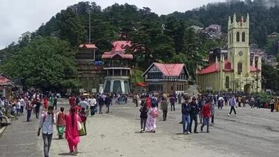 People strolling at the Ridge in the heart of Shimla. Hotels and travel agents are offering discounts aimed at reviving the ₹2,000-crore tourism industry after the setback due to the unprecedented spells of heavy rain this monsoon. (Deepak Sansta/HT) People strolling at the Ridge in the heart of Shimla. Hotels and travel agents are offering discounts aimed at reviving the ₹2,000-crore tourism industry after the setback due to the unprecedented spells of heavy rain this monsoon. (Deepak Sansta/HT)