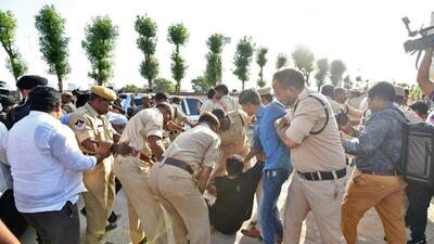 Police personnel detain Telugu Desam Party supporters during their protest against the arrest of former Andhra Pradesh chief minister and party chief N Chandrababu Naidu, in Nandyal on Saturday (ANI) Police personnel detain Telugu Desam Party supporters during their protest against the arrest of former Andhra Pradesh chief minister and party chief N Chandrababu Naidu, in Nandyal on Saturday (ANI)