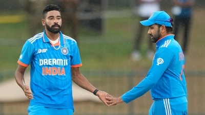 India's Mohammed Siraj celebrates wicket of Nepal's Aasif Sheikh with captain Rohit Sharma during the Asia Cup 2023 (AP) India's Mohammed Siraj celebrates wicket of Nepal's Aasif Sheikh with captain Rohit Sharma during the Asia Cup 2023 (AP)