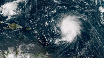 This satellite image provided by NOAA shows Hurricane Lee over the Atlantic Ocean on September 8, 2023, at 15h50UTC. Lee is now a Category 4 storm with 155 mph (249 kph) winds and is about 550 miles (885 kms) east of the northern Leeward Islands. (Photo by Handout / NOAA/GOES / AFP) / RESTRICTED TO EDITORIAL USE - MANDATORY CREDIT "AFP PHOTO / NOAA/GOES" - NO MARKETING NO ADVERTISING CAMPAIGNS - DISTRIBUTED AS A SERVICE TO CLIENTS (AFP) This satellite image provided by NOAA shows Hurricane Lee over the Atlantic Ocean on September 8, 2023, at 15h50UTC. Lee is now a Category 4 storm with 155 mph (249 kph) winds and is about 550 miles (885 kms) east of the northern Leeward Islands. (Photo by Handout / NOAA/GOES / AFP) / RESTRICTED TO EDITORIAL USE - MANDATORY CREDIT "AFP PHOTO / NOAA/GOES" - NO MARKETING NO ADVERTISING CAMPAIGNS - DISTRIBUTED AS A SERVICE TO CLIENTS (AFP)