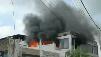 Fire breaks out at a car showroom in Rewari, Haryana.