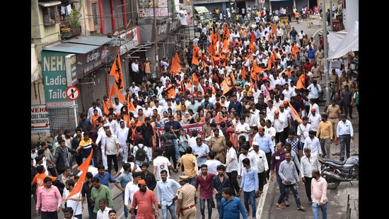Several protesters from the Maratha community took out a rally and raised slogans against alleged police atrocities against the protesters in Pimpri-Chinchwad on Saturday. (HT PHOTO)