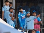 Rohit Sharma in a conversation with teammates after rain stops play during the Super Four match between India and Pakistan Rohit Sharma in a conversation with teammates after rain stops play during the Super Four match between India and Pakistan