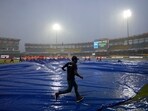 Ground staff pull covers as it rains during the Asia Cup cricket match between India and Pakistan in Colombo. Ground staff pull covers as it rains during the Asia Cup cricket match between India and Pakistan in Colombo.