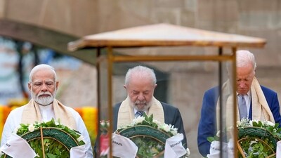 Prime Minister Narendra Modi, US President Joe Biden, Indonesia President Joko Widodo and Brazil President Luiz Inácio Lula da Silva lay wreath at Raj Ghat to pay homage to Mahatma Gandhi, in New Delhi on Sunday. (PMO) Prime Minister Narendra Modi, US President Joe Biden, Indonesia President Joko Widodo and Brazil President Luiz Inácio Lula da Silva lay wreath at Raj Ghat to pay homage to Mahatma Gandhi, in New Delhi on Sunday. (PMO)