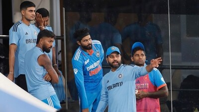 Rohit Sharma in a conversation with teammates after rain stops play during the Super Four match between India and Pakistan (ANI) Rohit Sharma in a conversation with teammates after rain stops play during the Super Four match between India and Pakistan (ANI)