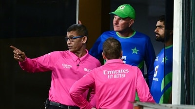 Pakistan's captain Babar Azam in a conversation with umpires Chris Gaffaney and Ruchira Palliyagurugeare after rain stops play (ANI) Pakistan's captain Babar Azam in a conversation with umpires Chris Gaffaney and Ruchira Palliyagurugeare after rain stops play (ANI)