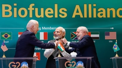 US President Joe Biden (left), Prime Minister Narendra Modi and Brazilian President Luiz Inacio Lula da Silva hold hands as they attend the launch of the Global Biofuels Alliance at the G20 summit in New Delhi on Saturday. (AP) US President Joe Biden (left), Prime Minister Narendra Modi and Brazilian President Luiz Inacio Lula da Silva hold hands as they attend the launch of the Global Biofuels Alliance at the G20 summit in New Delhi on Saturday. (AP)
