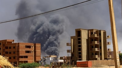 Smoke rises above buildings after an aerial bombardment during clashes between the paramilitary Rapid Support Forces and the army, in Khartoum. (Reuters)