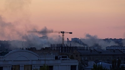 Russia-Ukraine War: Smoke rises above buildings following a shelling in the course of Russia-Ukraine conflict in Donetsk, Russian-controlled Ukraine. (Reuters)
