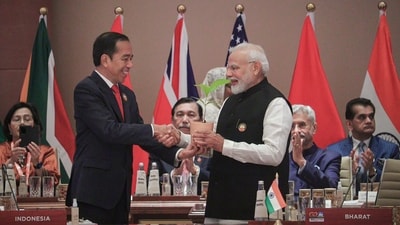 PM Modi with Indonesian President Joko Widodo during the symbolic tree plantation ceremony on the final day of the G20 Summit 2023 at the Bharat Mandapam. Indonesian President Joko Widodo and his Brazilian counterpart Luiz Inacio Lula da Silva presented saplings of their native plants to the PM at the outset of the Summit's third session. (PTI) PM Modi with Indonesian President Joko Widodo during the symbolic tree plantation ceremony on the final day of the G20 Summit 2023 at the Bharat Mandapam. Indonesian President Joko Widodo and his Brazilian counterpart Luiz Inacio Lula da Silva presented saplings of their native plants to the PM at the outset of the Summit's third session. (PTI)