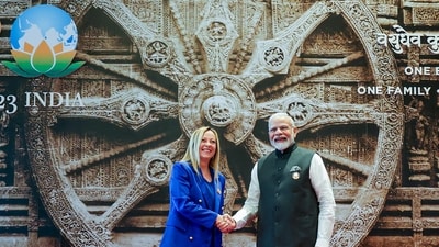 Prime Minister Narendra Modi (R) shakes hands with Italy's Prime Minister Giorgia Meloni upon her arrival at Bharat Mandapam convention center for the G20 Summit. Modi also held bilateral talks with his Italian counterpart Giorgia Meloni where he appreciated Italy joining the Global Biofuel Alliance and the India-Middle East-Europe Economic Corridor partnership. (AFP) Prime Minister Narendra Modi (R) shakes hands with Italy's Prime Minister Giorgia Meloni upon her arrival at Bharat Mandapam convention center for the G20 Summit. Modi also held bilateral talks with his Italian counterpart Giorgia Meloni where he appreciated Italy joining the Global Biofuel Alliance and the India-Middle East-Europe Economic Corridor partnership. (AFP)