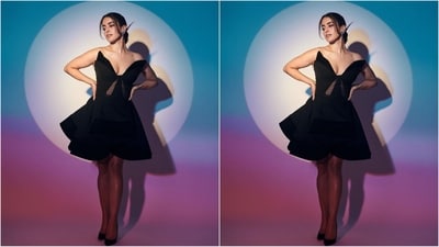 Assisted by celebrity fashion stylist Sukirti Grover, Sanya kept her accessories to a minimum, styling her look with heart-shaped stud earrings, black net stockings, a diamond ring adorning her finger and a pair of black pump heels. (Instagram/@sanyamalhotra_) Assisted by celebrity fashion stylist Sukirti Grover, Sanya kept her accessories to a minimum, styling her look with heart-shaped stud earrings, black net stockings, a diamond ring adorning her finger and a pair of black pump heels. (Instagram/@sanyamalhotra_)