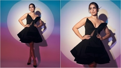 Sanya's stunning black outfit was designed by Saisha Shinde. It features no sleeves, a butterfly wing pattern at the neckline, sheer fabric at the midriff, a body-con fit and a flared hem. (Instagram/@sanyamalhotra_) Sanya's stunning black outfit was designed by Saisha Shinde. It features no sleeves, a butterfly wing pattern at the neckline, sheer fabric at the midriff, a body-con fit and a flared hem. (Instagram/@sanyamalhotra_)