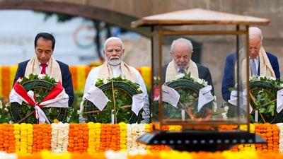 Prime Minister Narendra Modi, US President Joe Biden, Brazil's President Luiz Inacio Lula da Silva and Indonesian President Joko Widodo pay homage at Mahatma Gandhi's memorial Rajghat as they lay a wreath at Mahatma Gandhi's Samadhi, on the final day of the G20 Summit, in New Delhi, Sunday, Sep 10, 2023. (PTI) Prime Minister Narendra Modi, US President Joe Biden, Brazil's President Luiz Inacio Lula da Silva and Indonesian President Joko Widodo pay homage at Mahatma Gandhi's memorial Rajghat as they lay a wreath at Mahatma Gandhi's Samadhi, on the final day of the G20 Summit, in New Delhi, Sunday, Sep 10, 2023. (PTI)