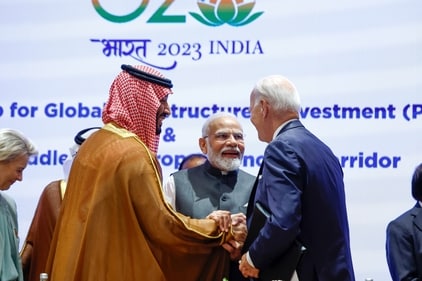 Saudi Arabian Crown Prince Mohammed bin Salman, left, and U.S. President Joe Biden, right, shake hands next to Indian Prime Minister Narendra Modi. (AP) Saudi Arabian Crown Prince Mohammed bin Salman, left, and U.S. President Joe Biden, right, shake hands next to Indian Prime Minister Narendra Modi. (AP)