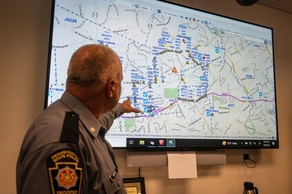 Lt. Col George Vivens shows the map of the area delineated by law enforcement and their vehicles, during a media tour, at the Incident Command Center Where Pennsylvania State Troopers, U.S. Border Patrol, Chester County Emergency Management, and FBI are collaborating on the intergovernmental manhunt searching for escaped inmate Danelo Cavalcante, at the Po-Mar-Lin Fire Company, in Unionville, Pa., Friday, Sept. 8, 2023. (Jessica Griffin/The Philadelphia Inquirer via AP) (AP) Lt. Col George Vivens shows the map of the area delineated by law enforcement and their vehicles, during a media tour, at the Incident Command Center Where Pennsylvania State Troopers, U.S. Border Patrol, Chester County Emergency Management, and FBI are collaborating on the intergovernmental manhunt searching for escaped inmate Danelo Cavalcante, at the Po-Mar-Lin Fire Company, in Unionville, Pa., Friday, Sept. 8, 2023. (Jessica Griffin/The Philadelphia Inquirer via AP) (AP)