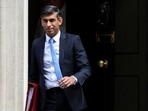 British Prime Minister Rishi Sunak leaves his Downing Street office in London.