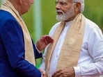 Prime Minister Narendra Modi with US President Joe Biden at Mahatma Gandhi's memorial Rajghat on the final day of the G20 Summit. (PTI) Prime Minister Narendra Modi with US President Joe Biden at Mahatma Gandhi's memorial Rajghat on the final day of the G20 Summit. (PTI)