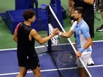 Serbia's Novak Djokovic (R) and USA's Ben Shelton shake hands after Djokovic's win of the US Open tennis tournament men's singles semi-finals match at the USTA Billie Jean King National Tennis Center Serbia's Novak Djokovic (R) and USA's Ben Shelton shake hands after Djokovic's win of the US Open tennis tournament men's singles semi-finals match at the USTA Billie Jean King National Tennis Center